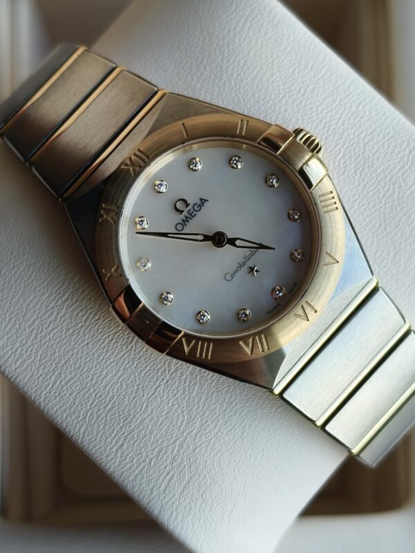 Omega Constellation Manhatan (stal / żółte złoto 18K)
